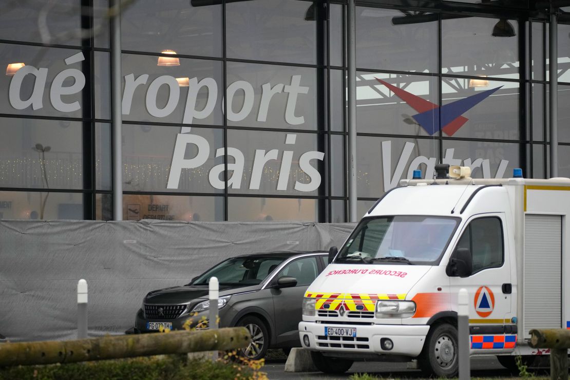 A rescue vehicle parks outside the Vatry airport, eastern France, Saturday, Dec. 23, 2023 in Vatry, eastern France. About 300 Indian citizens heading to Central America were sequestered in a French airport for a third day Saturday because of an investigation into suspected human trafficking, authorities said. The 15 crew members of the Legend Airlines charter flight en route from United Arab Emirates to Nicaragua were questioned and released, according to a lawyer for the small Romania-based airline. (AP Photo/Christophe Ena)