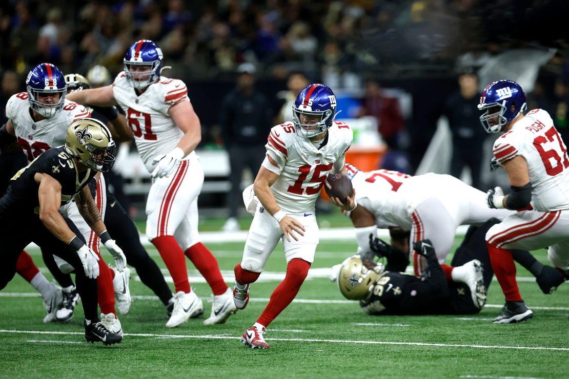 NEW ORLEANS, LOUISIANA - DECEMBER 17: Tommy DeVito #15 of the New York Giants carries the ball during the second half of the game against the New Orleans Saints at Caesars Superdome on December 17, 2023 in New Orleans, Louisiana. (Photo by Chris Graythen/Getty Images)