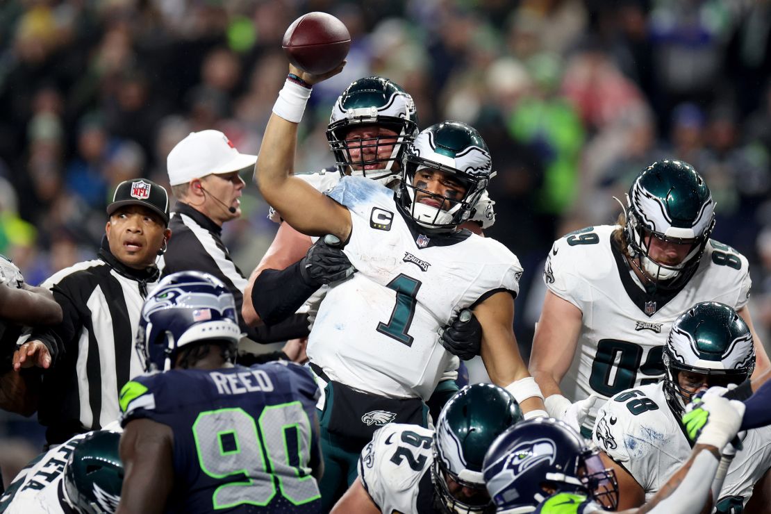 SEATTLE, WASHINGTON - DECEMBER 18: Jalen Hurts #1 of the Philadelphia Eagles celebrates after a touchdown in the third quarter at Lumen Field on December 18, 2023 in Seattle, Washington. (Photo by Steph Chambers/Getty Images)