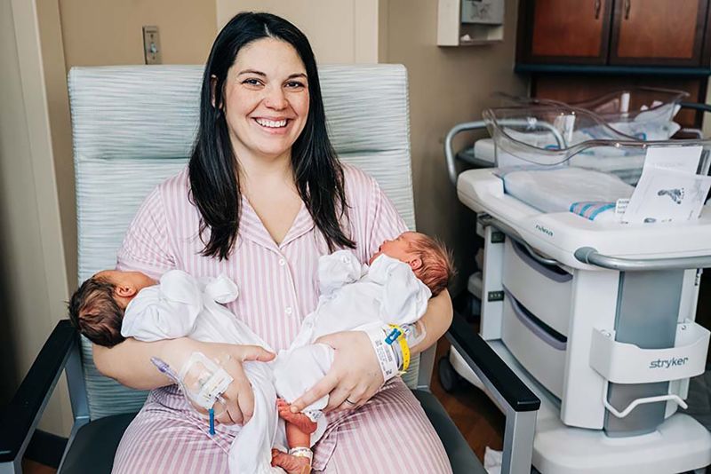 Kelsey Hatcher gave birth to two girls after becoming pregnant in both of her two uteruses earlier this year. Kelsey holds Roxi on the left and Rebel on the right.