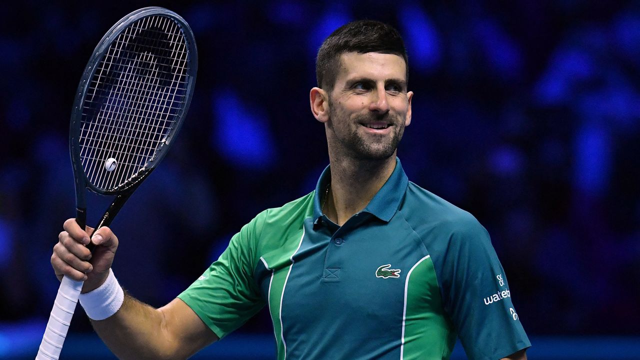 Serbia's Novak Djokovic celebrates after winning the first round-robin match against Denmark's Holger Rune at the ATP Finals tennis tournament in Turin on November 12, 2023.