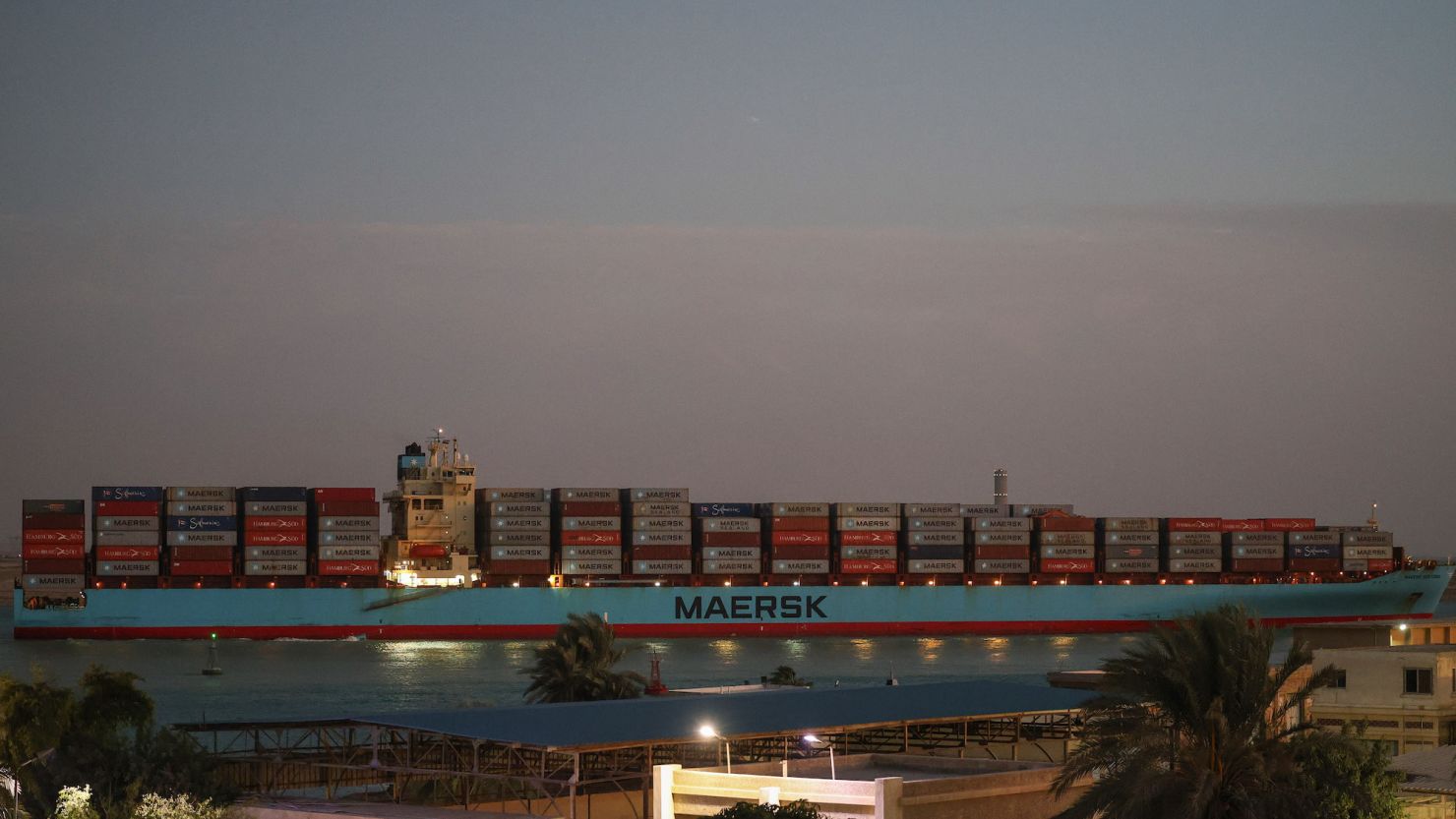 The Maersk Sentosa container ship sails southbound to exit the Suez Canal in Suez, Egypt, on Thursday, Dec. 21, 2023. A steep decline in the number of tankers entering a vital Red Sea conduit suggests that attacks on ships in the area are further disrupting a key artery of global trade. Photographer: Stringer/Bloomberg