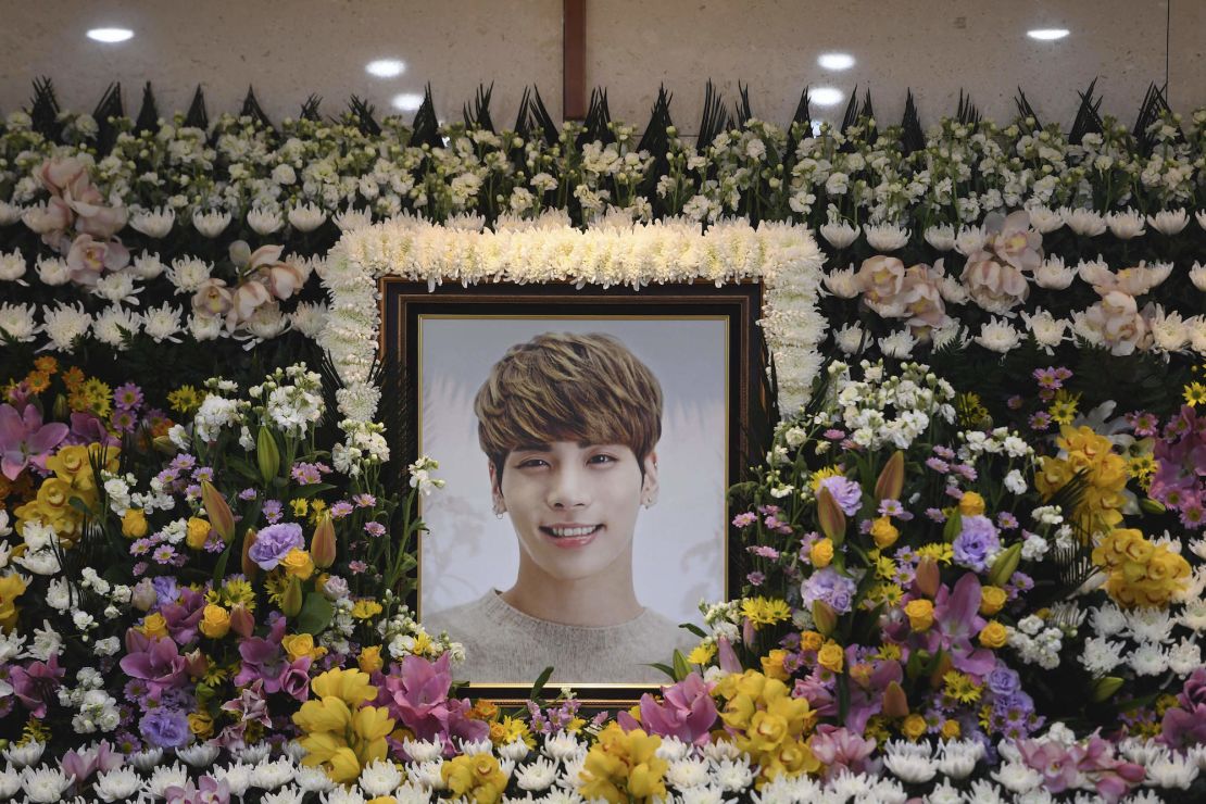 A portrait of Kim Jong-hyun, better known by the stage name Jonghyun, a member of South Korean K-pop group SHINee, is seen at a hospital in Seoul, South Korea, Tuesday, Dec. 19, 2017. The lead singer of popular South Korean boy band SHINee died on Monday, police said, in a possible suicide. (Yonhap via AP)