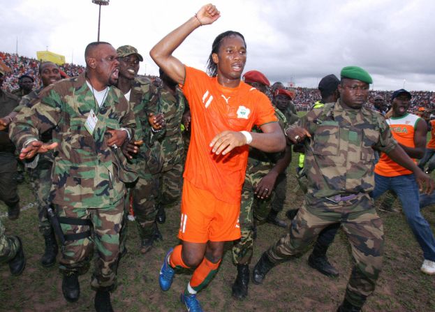 Chelsea legend Didier Drogba was center-stage again for entirely different reasons during the AFCON qualifying stages in 2007. Credited with playing a <a href="index.php?page=&url=https%3A%2F%2Fwww.cnn.com%2F2017%2F11%2F11%2Ffootball%2Fivory-coast-didier-drogba-stops-civil-war-copa%2Findex.html" target="_blank">role in helping to end Ivory Coast's bloody civil war</a>, pictures of the striker being escorted off the pitch by Ivorian rebel soldiers moments after scoring the final goal in a 5-0 win over Madagascar in Bouake -- the base of the rebellion -- symbolized his unifying impact.