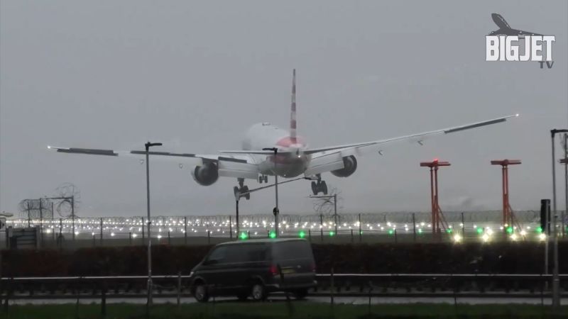 Witness loses it as plane struggles to land during fierce storm