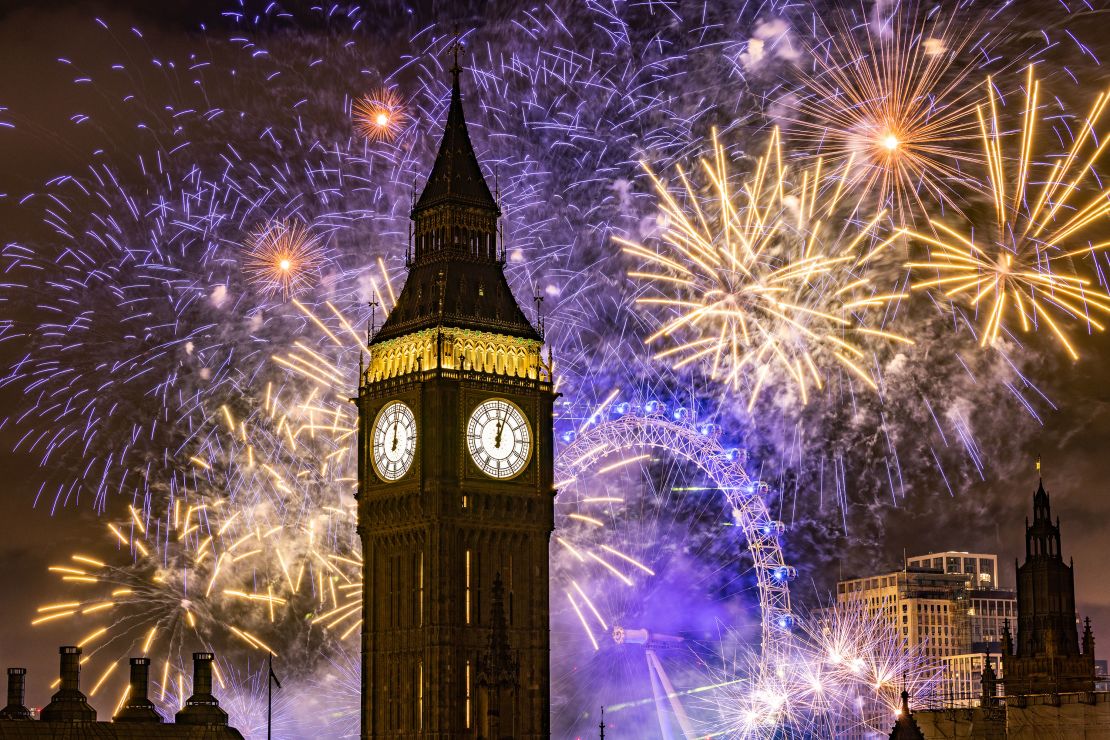 LONDON, ENGLAND - JANUARY 1: Fireworks light up the London skyline over Big Ben and the London Eye just after midnight on January 1, 2023 in London, England. London's New Years' Eve firework display returned this year after it was cancelled during the Covid Pandemic. (Photo by Dan Kitwood/Getty Images)