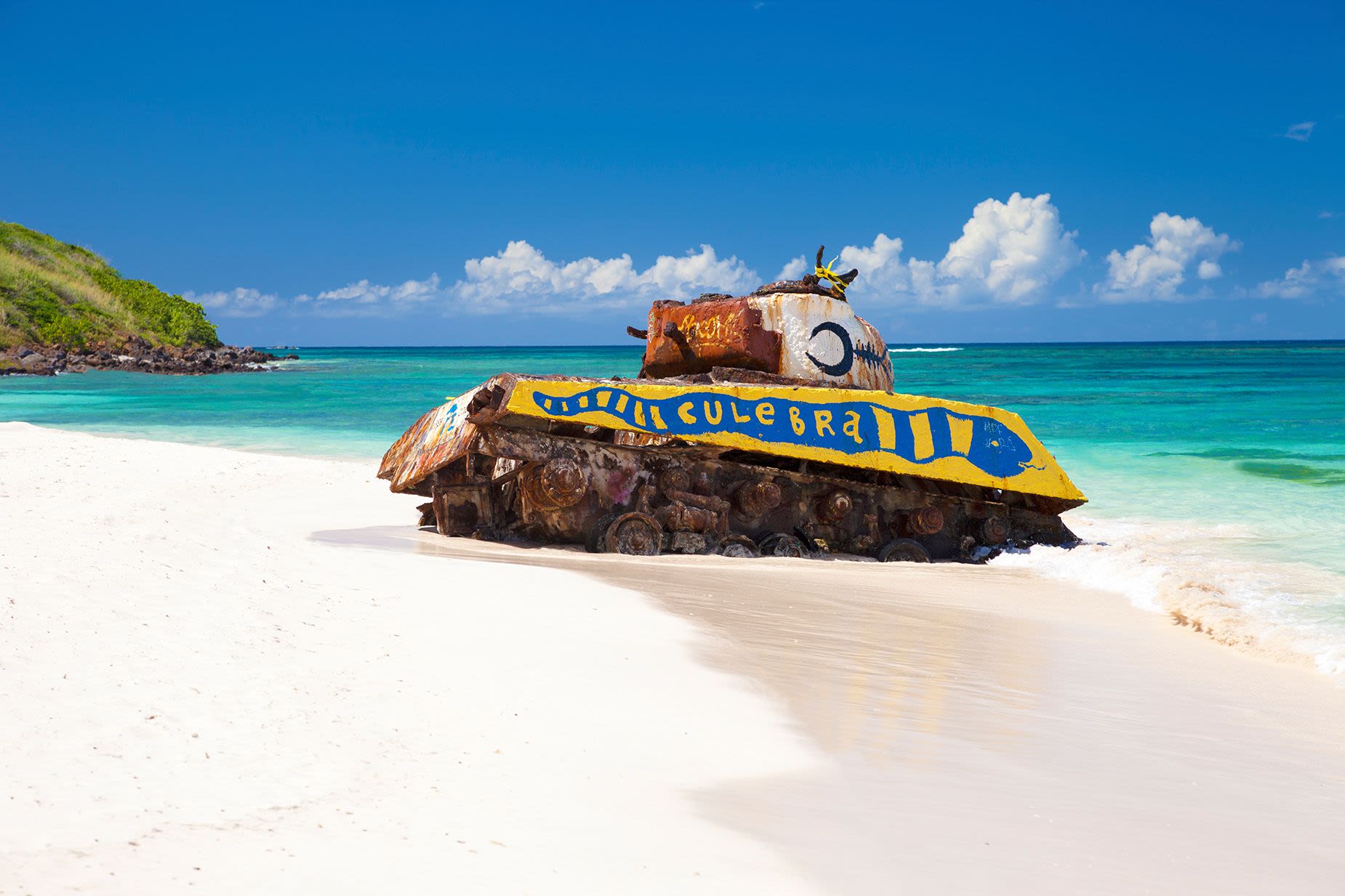 old, rusted and deserted US army tank on Flamenco Beach in Culebra Island near Puerto Rico, USA