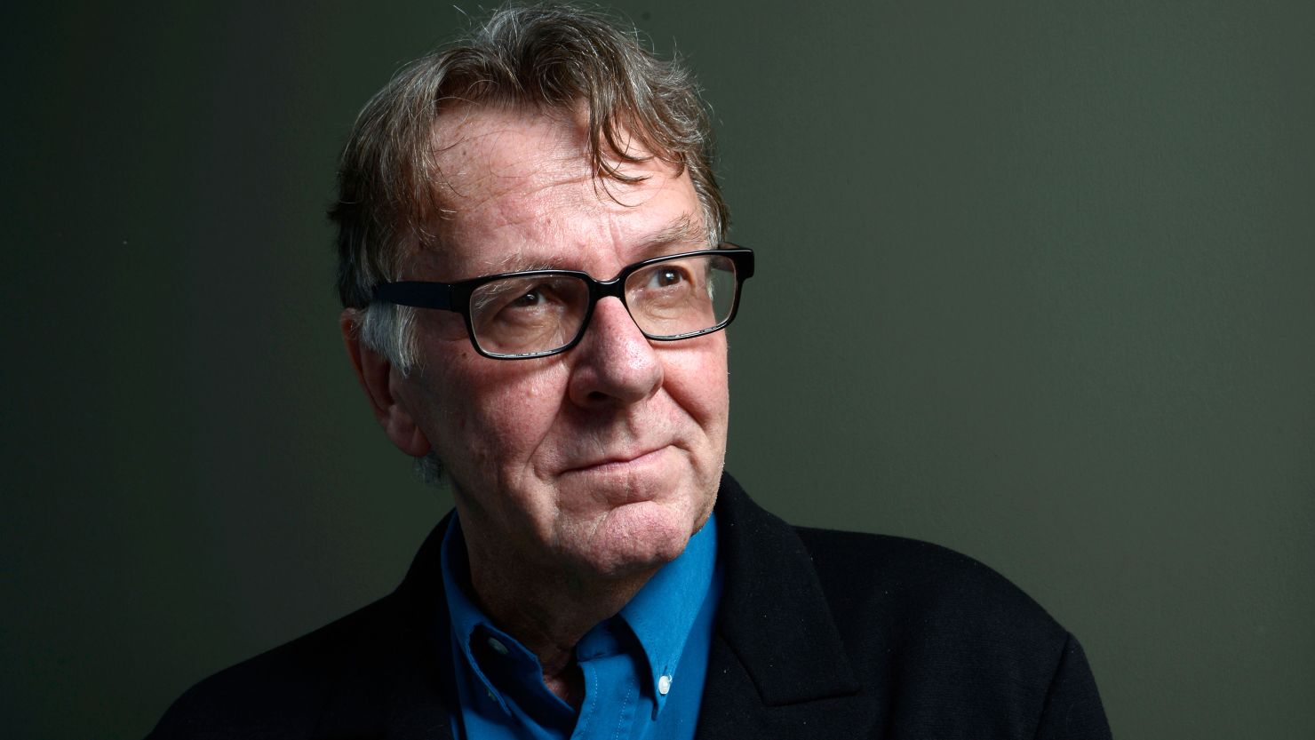 Actor Tom Wilkinson of 'Belle' poses at the Guess Portrait Studio during 2013 Toronto International Film Festival on September 9, 2013 in Toronto, Canada.