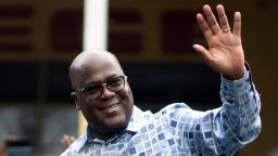 Congo's President Felix Tshisekedi waves to his supporters after casting his ballot inside a polling station during the presidential elections in Kinshasa, Democratic Republic of Congo, Wednesday, Dec. 20, 2023. Congo's President Felix Tshisekedi wins reelection with over 70% of vote, election commission says.