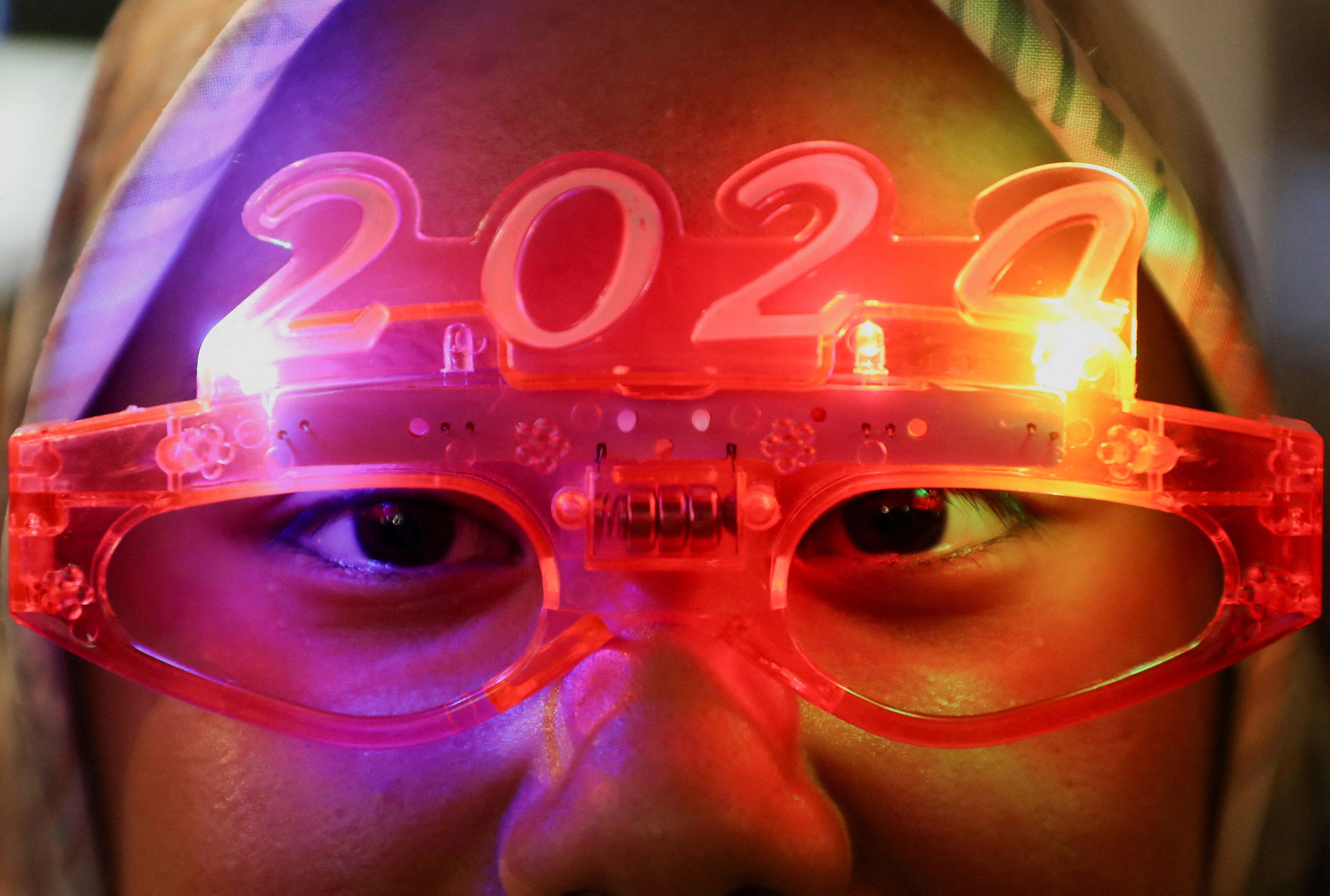 A woman wears 2024 glasses in Kuala Lumpur, Malaysia.