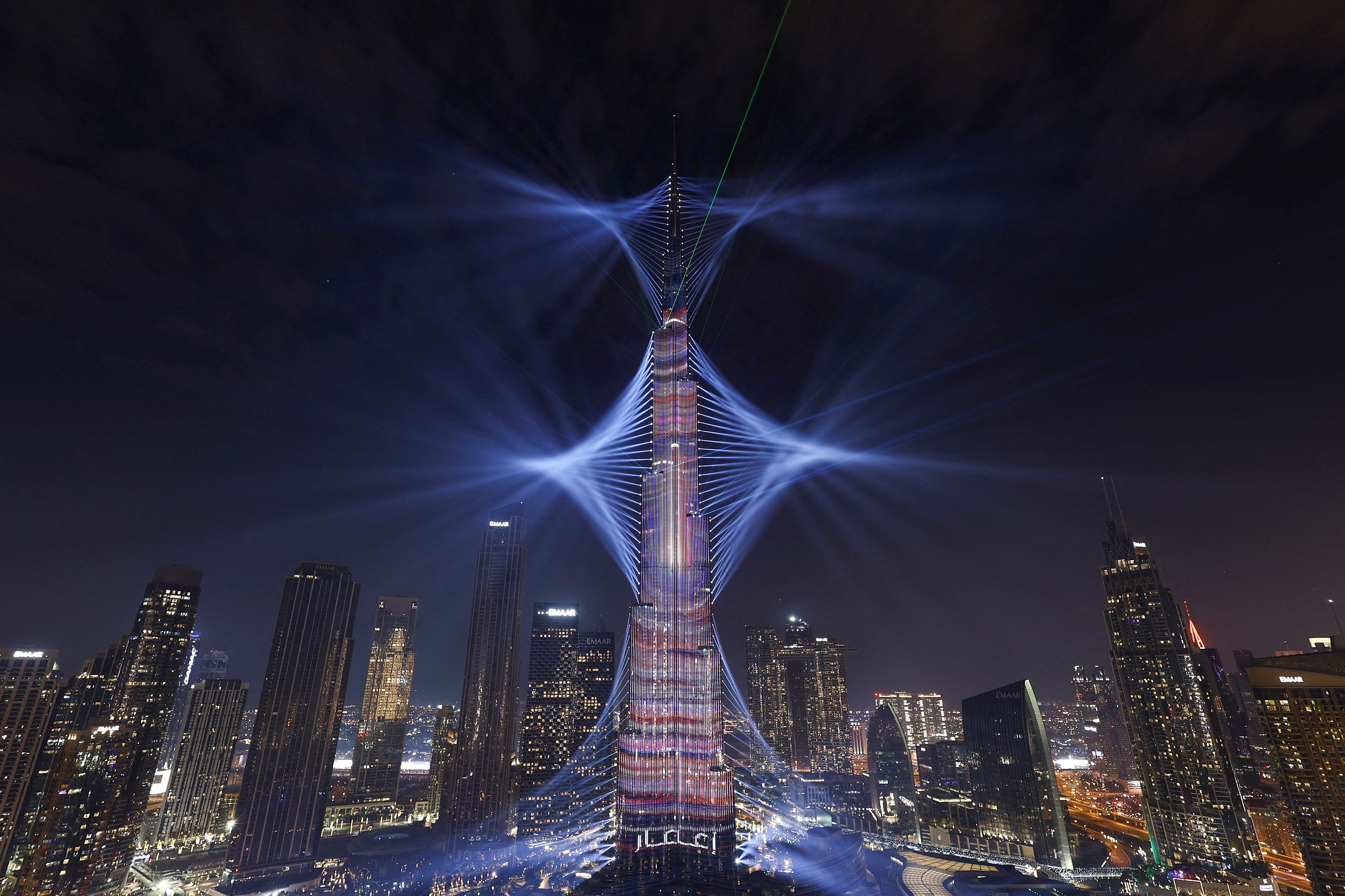 Lights are projected from the Burj Khalifa, the tallest building in the world, during celebrations in Dubai.