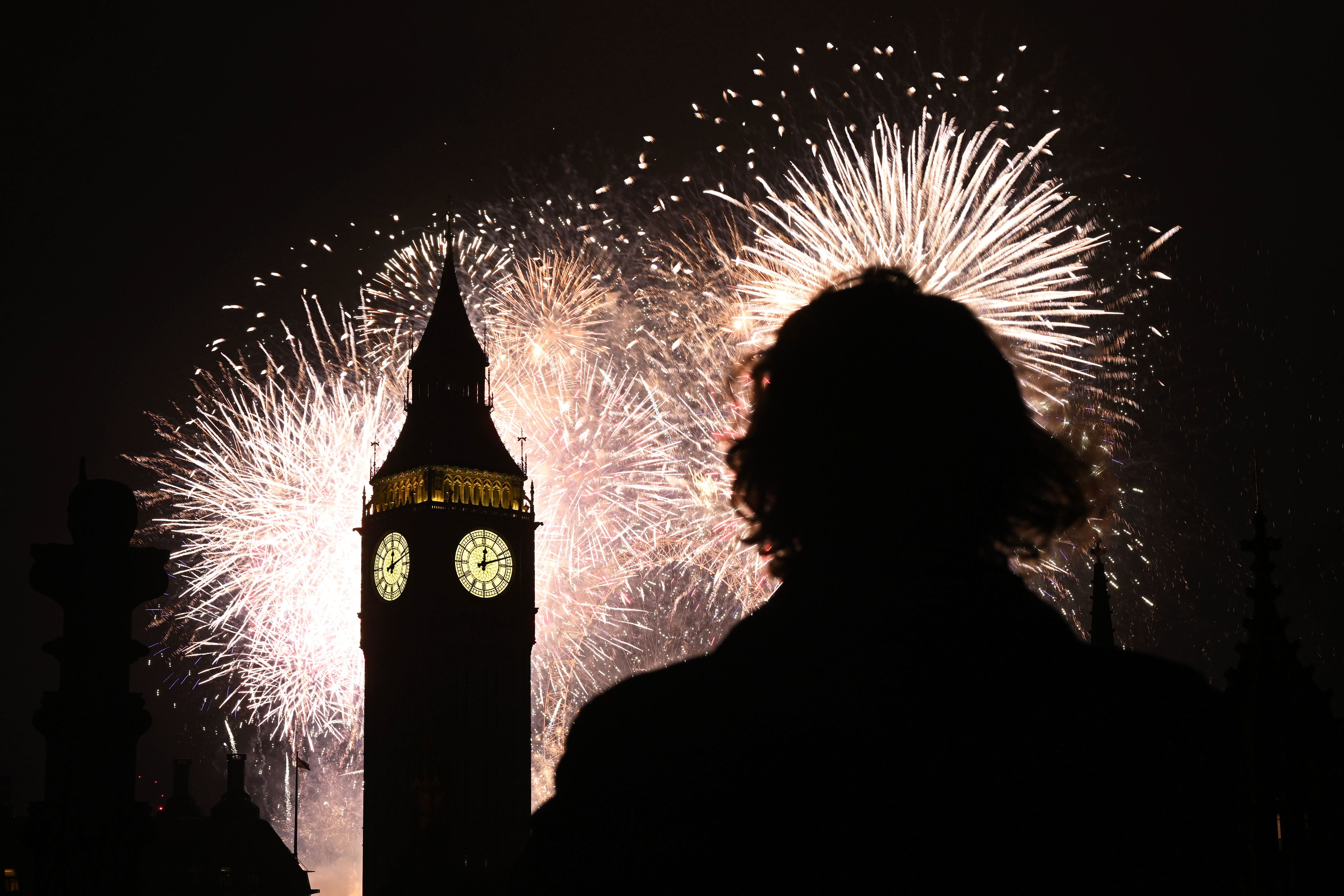 Fireworks burst over Big Ben in London.