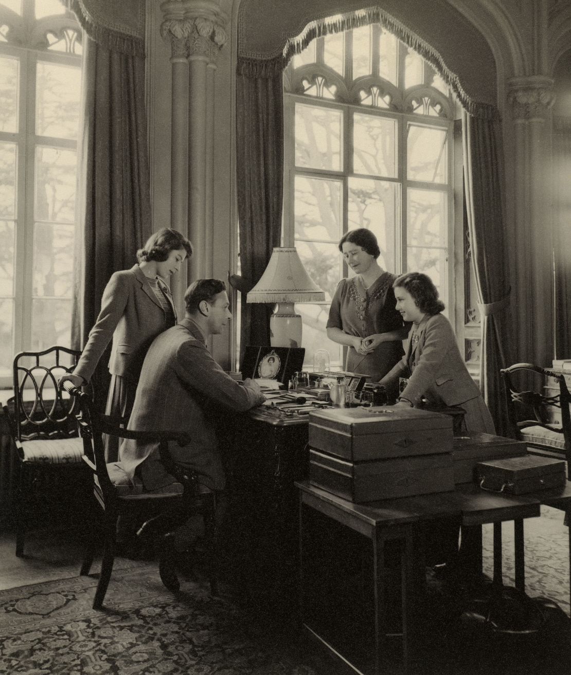 The Royal Family at Royal Lodge, 1943, conveying a reassuring sense of domesticity and calm during the war.