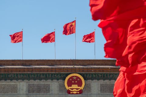 Chinese national flags flutter on the Great Hall of the People on October 16.