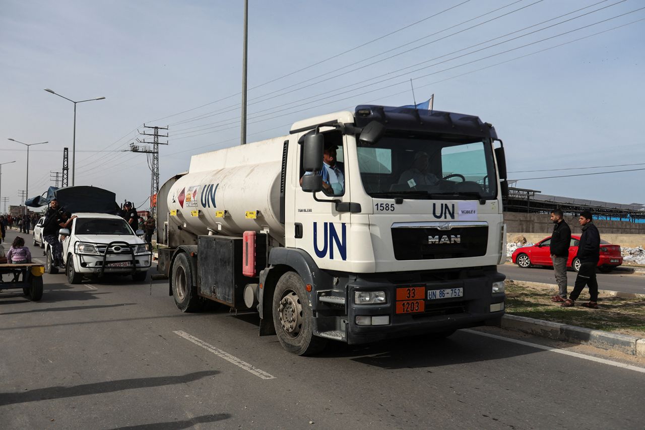 Aid trucks travel along a road in Rafah, Gaza, on November 25. 