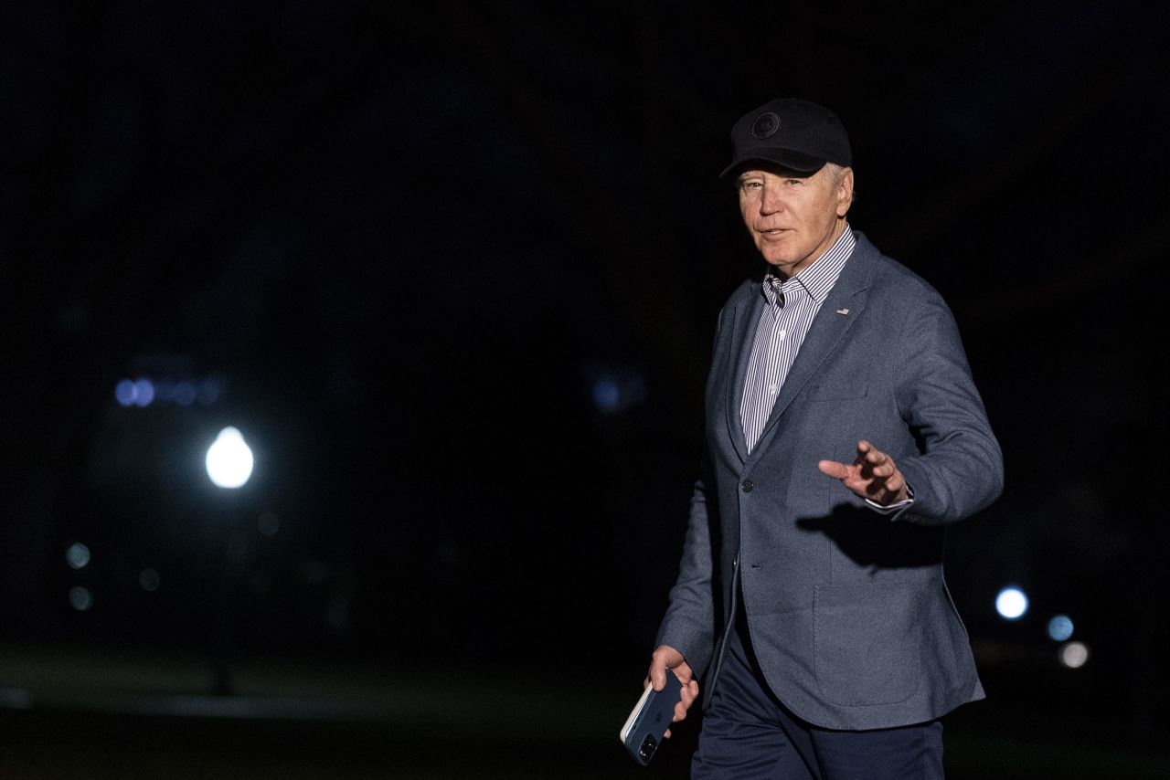 US President Joe Biden walks across the South Lawn of the White House after arriving in Washington, DC, on Monday, February 5.