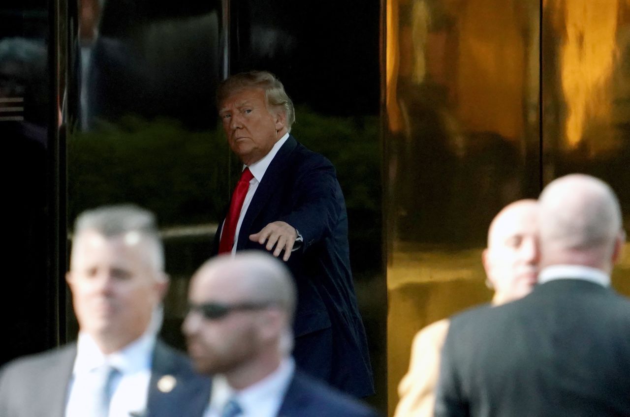 Former President Donald Trump arrives at Trump Tower ahead of his expected arraignment Tuesday. 