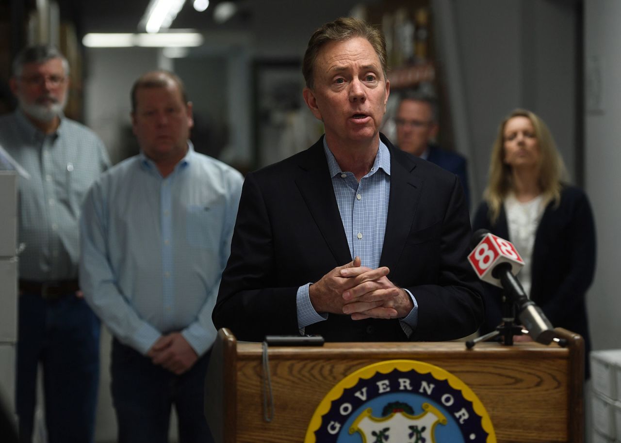 Gov. Ned Lamont addresses the media last month at medical equipment manufacturer Bio-Med Devices in Guilford, Connecticut.