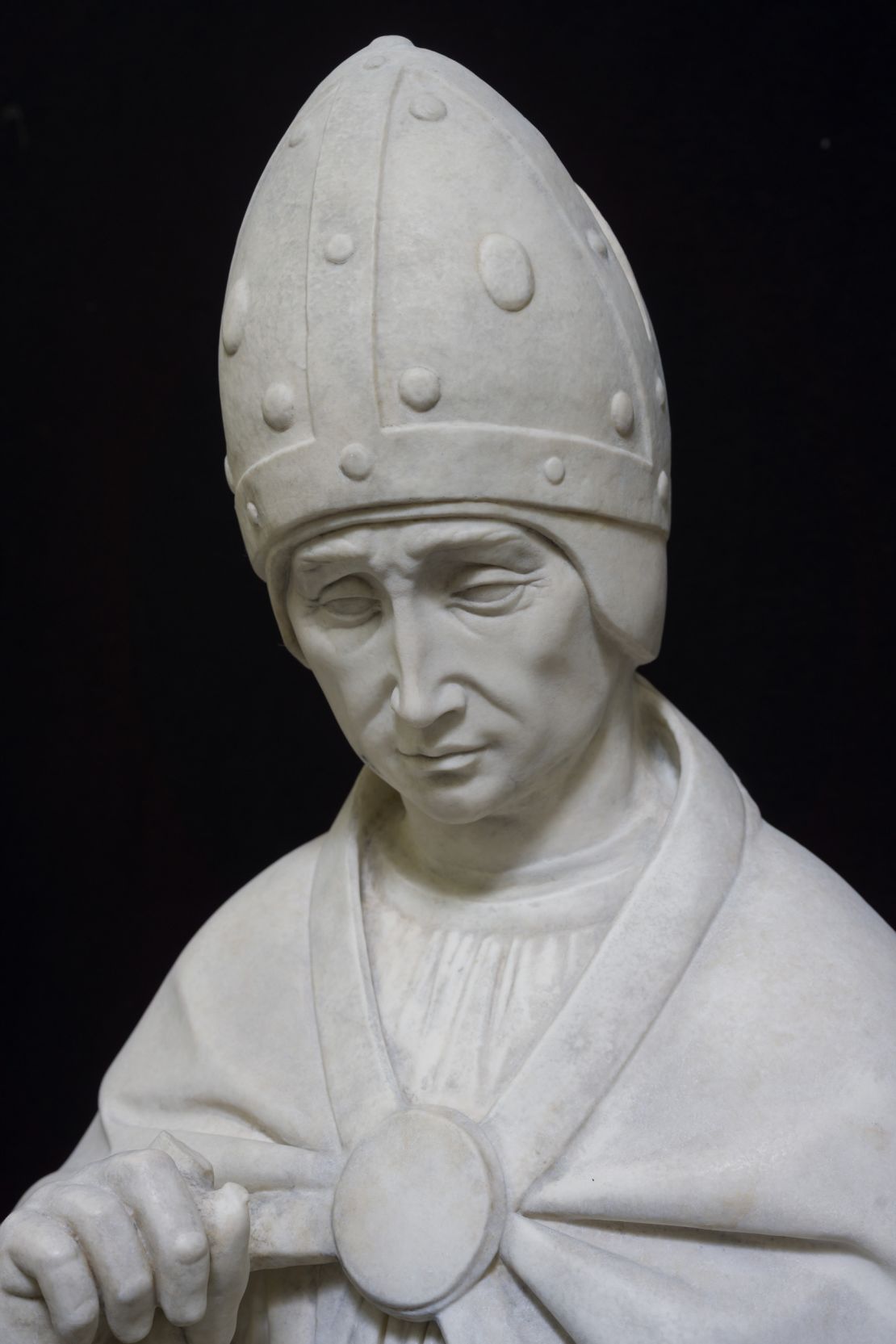 A detail of Factum Arte's copy of Saint Pius, which accompanies Saint Paul and two other saints in its original location.