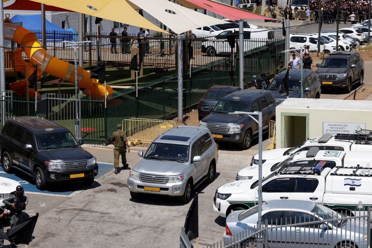 The convoy of Israeli Prime Minister Benjamin Netanyahu is seen in the Druze village of Majdal Shams, in the Israeli annexed Golan Heights, on Monday.