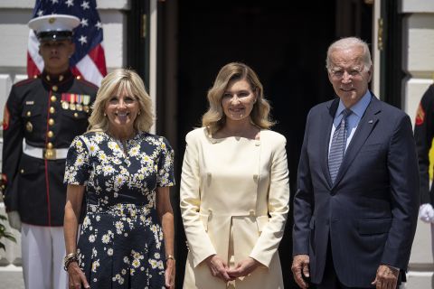 U.S. first lady Jill Biden, first lady of Ukraine Olena Zelenska and U.S. President Joe Biden pose for photos as Zelenska arrives on the South Lawn of the White House on July 19 in Washington, DC. 