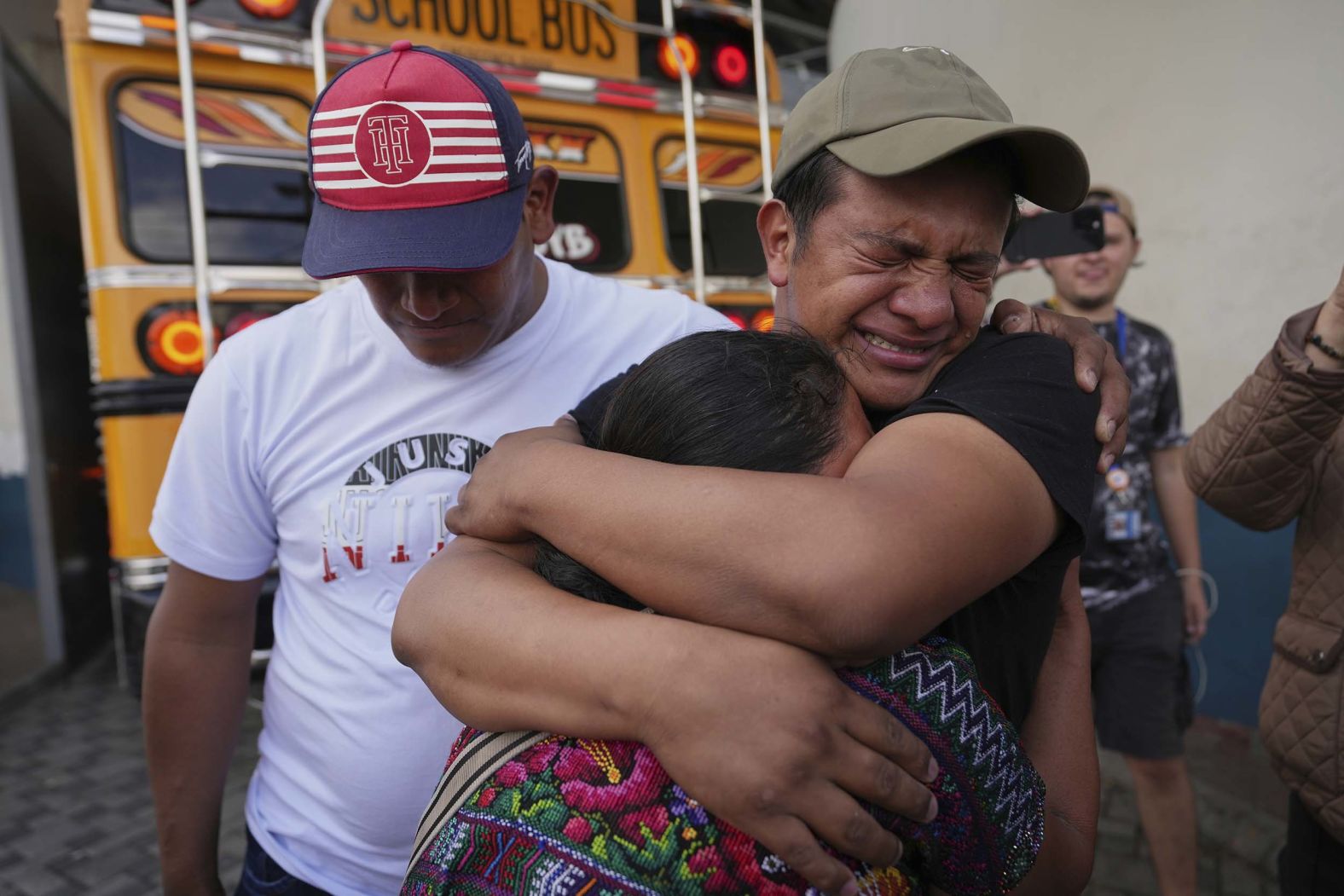 Edwin Osorio López embraces his mother, María Cristina López, outside an airport in Guatemala City after being deported from the United States on Sunday, August 31.