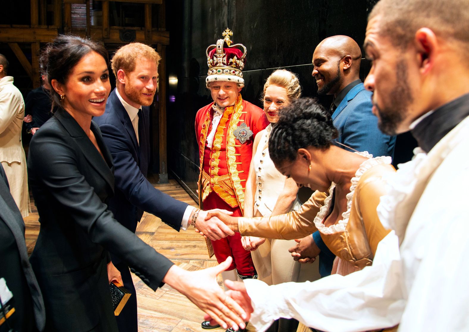 Britain's Prince Harry and Meghan, Duchess of Sussex, meet the cast of "Hamilton" after a special performance in London in August 2018.