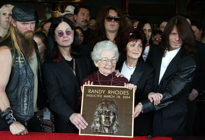 Osbourne and other rockers attend a ceremony with the mother of guitarist Randy Rhoades, who was being posthumously inducted into the Hollywood RockWalk in 2004. Rhoades died in a plane crash while touring with Osbourne in 1982.