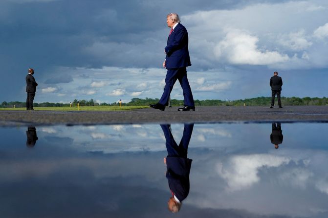 US President Donald Trump arrives at the Morristown Municipal Airport in Morristown, New Jersey, on Friday, May 23. The next day, he gave the <a  target="_top" href="/newspapers?url=https://www.cnn.com/politics/live-news/trump-presidency-news-05-24-25#cmb2brm3200003b6mom7ozgty">commencement speech</a> at the US Military Academy in West Point, New York.
