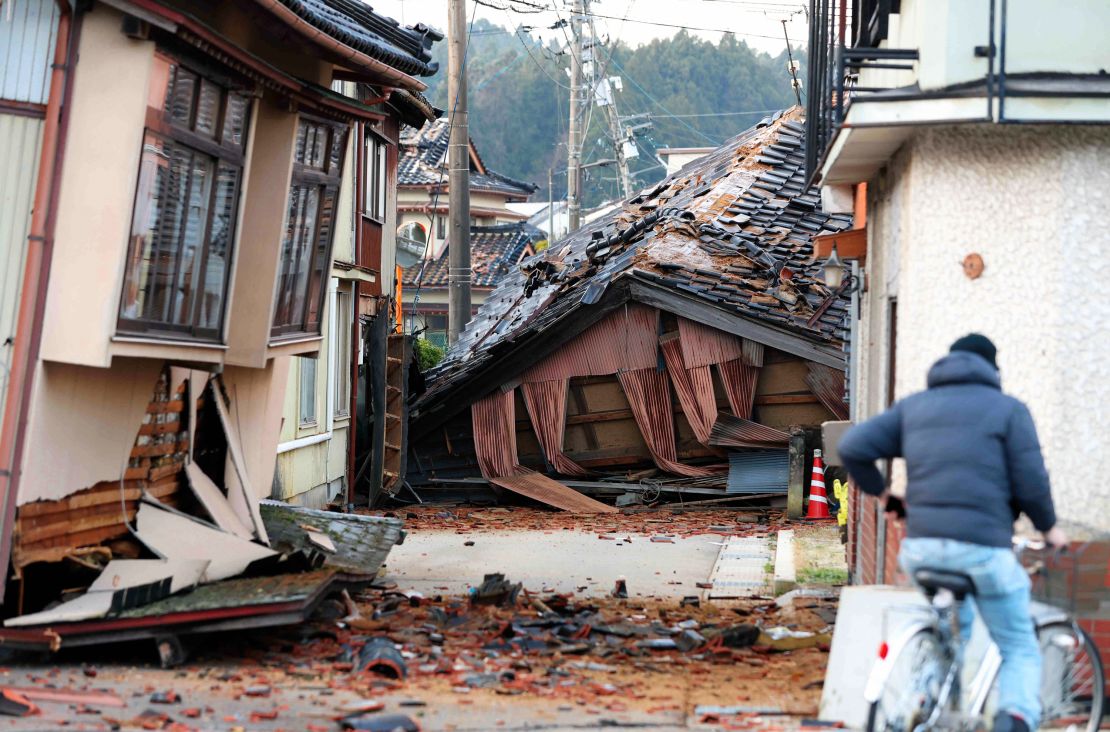 ANAMIZU, JAPAN - JANUARY 02: Damaged buildings are seen after multiple strong earthquakes hit the area previous day on January 2, 2024 in Anamizu, Ishikawa, Japan. A tsunami warning was issued Japan's coastline after a series of earthquakes, the biggest measuring 7.6 magnitude, hit the areas around Toyama and Niigata in central Japan. At least 7 people confirmed dead in Ishikawa Prefecture, where is the epicenter of the earthquakes. (Photo by The Asahi Shimbun via Getty Images)