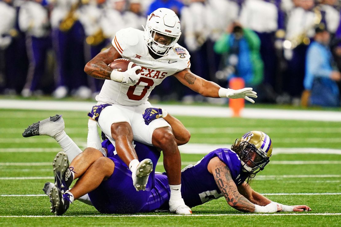 Jan 1, 2024; New Orleans, LA, USA; Texas Longhorns tight end Ja'Tavion Sanders (0) runs with the ball during the second quarter against the Washington Huskies in the 2024 Sugar Bowl college football playoff semifinal game at Caesars Superdome. Mandatory Credit: John David Mercer-USA TODAY Sports