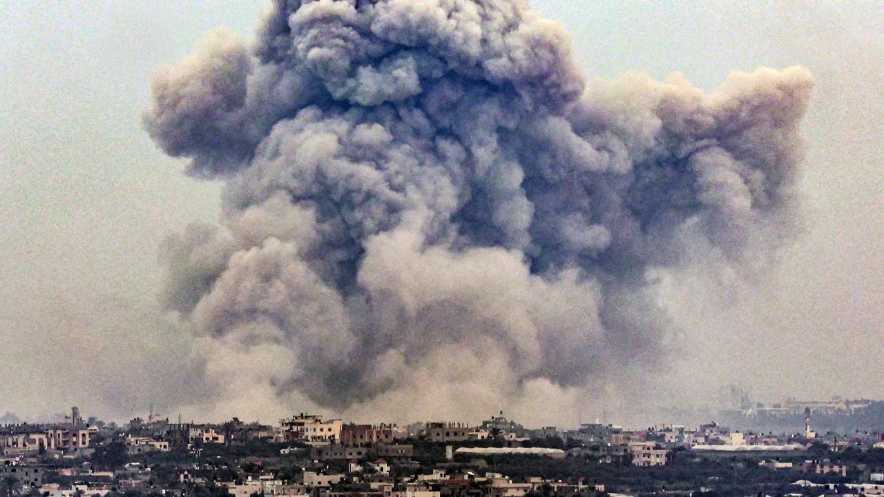 Smoke billows over Khan Yunis from Rafah in the southern Gaza strip during Israeli bombardment on January 2, 2024 amid the ongoing conflict between Israel and the Palestinian militant group Hamas.