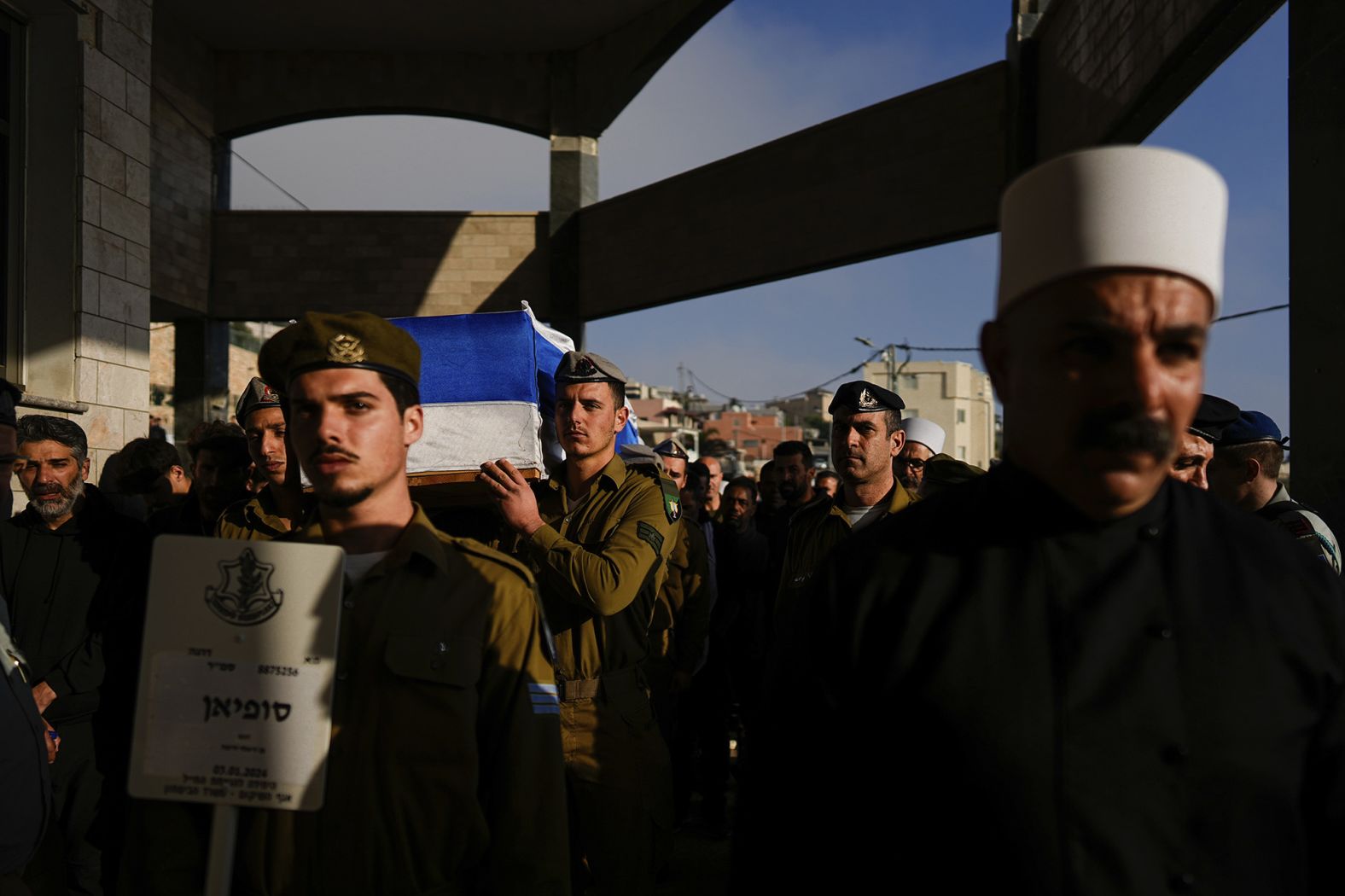 Israeli soldiers carry the flag-draped casket of Staff Sgt. Sufian Dagash during his funeral in the village of Maghar, northern Israel, on January 3.