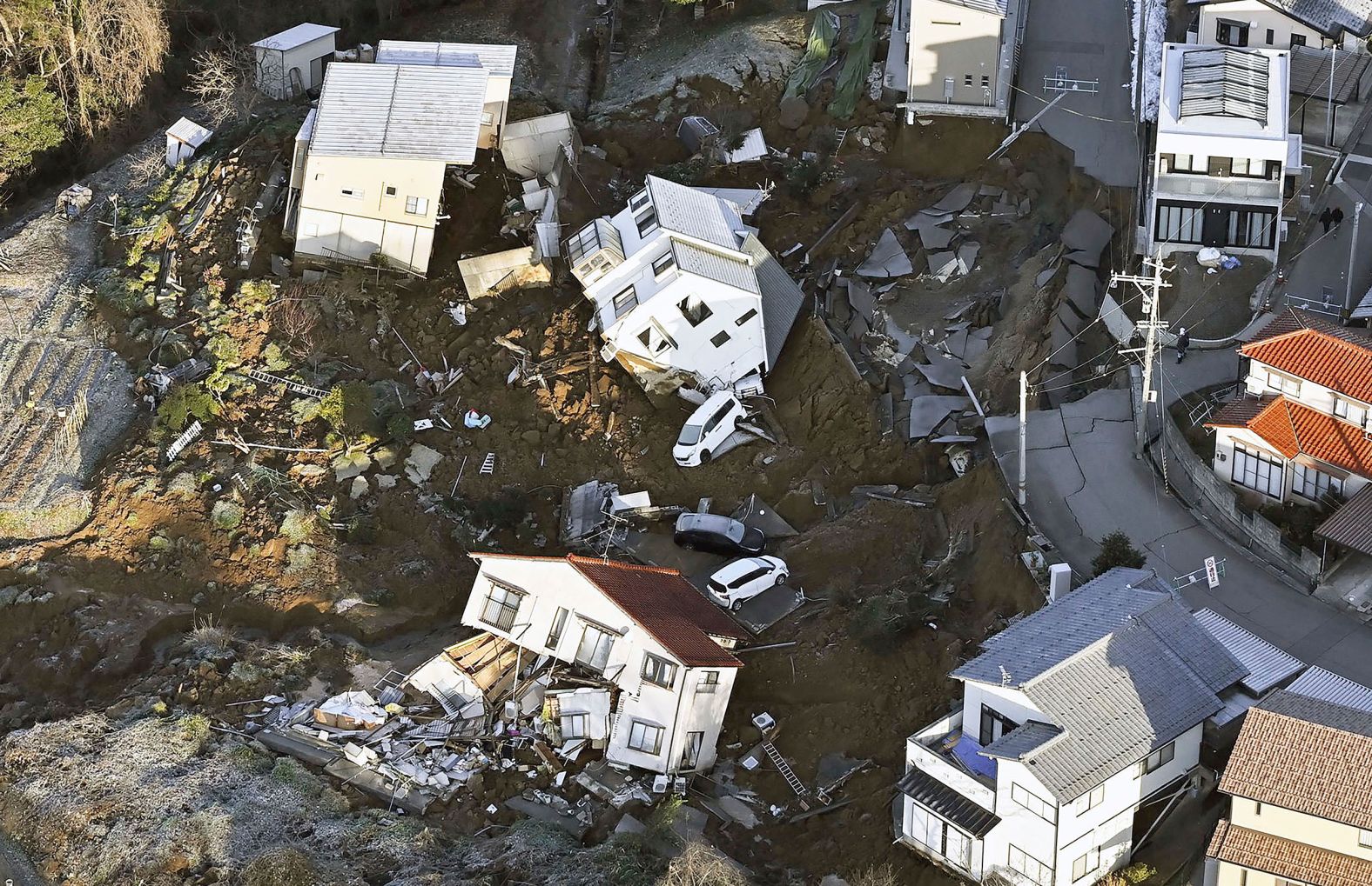 Houses are damaged in Kanazawa, Japan, after a <a href="index.php?page=&url=https%3A%2F%2Fwww.cnn.com%2F2024%2F01%2F03%2Fasia%2Fjapan-earthquake-shelters-aftermath-intl-hnk%2Findex.html" target="_blank">7.5 magnitude earthquake</a> struck the central part of the country on Monday, January 1. Dozens of people were killed, and dozens were still missing as of Thursday.