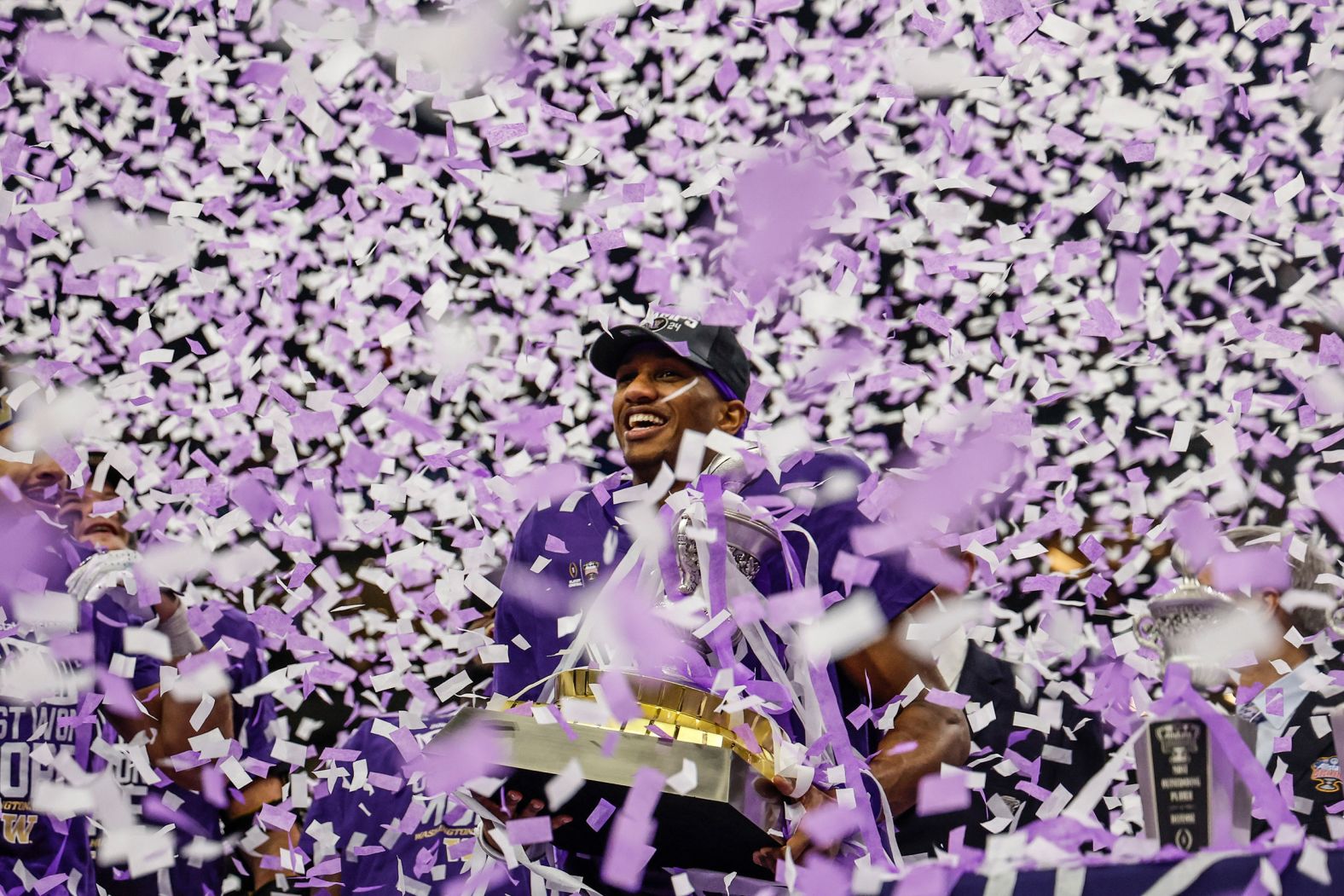 Washington Huskies quarterback Michael Penix Jr. celebrates Tuesday, January 2, after his team won the Sugar Bowl to <a href="index.php?page=&url=https%3A%2F%2Fwww.cnn.com%2F2024%2F01%2F01%2Fsport%2Fcollege-football-playoff-how-to-watch-spt-intl%2Findex.html" target="_blank">advance to the championship game of the College Football Playoff</a>. Penix threw for 430 yards and two touchdowns as Washington defeated Texas 37-31.