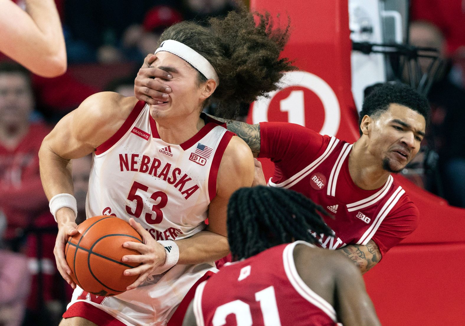 Indiana's Anthony Walker grabs the face of Nebraska's Josiah Allick during a college basketball game in Lincoln, Nebraska, on Wednesday, January 3. Walker was called for a flagrant foul on the play.