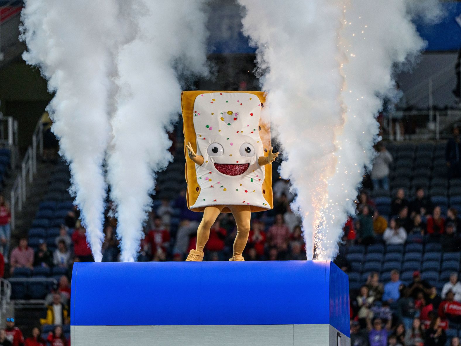 The Pop-Tarts Bowl mascot entertains the crowd during the first half of the college football game in Orlando, Florida, on Thursday, December 28. He was later "toasted" in the <a href="index.php?page=&url=https%3A%2F%2Fwww.cnn.com%2F2024%2F01%2F02%2Fus%2Fpop-tart-college-football-cheez-it-dukes-mascot-cec%2Findex.html" target="_blank">postgame festivities</a> while holding a sign that said "Dreams really do come true."