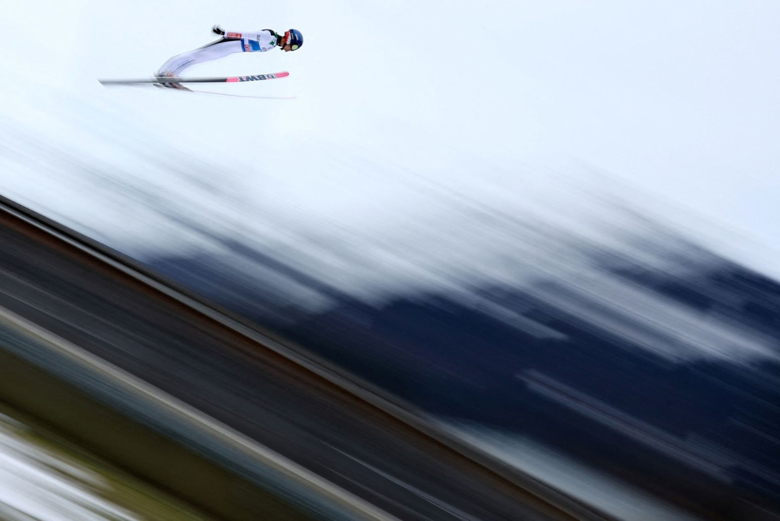 In this long-exposure photo, Polish ski jumper Maciej Kot practices for the Four Hills Tournament in Oberstdorf, Germany, on Thursday, December 28.