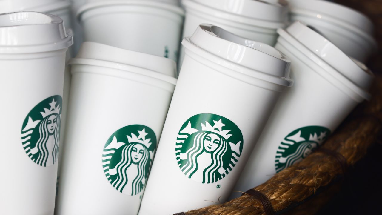 Starbucks reusable cups are seen on in Starbucks Coffee in Krakow, Poland on August 19, 2023.
