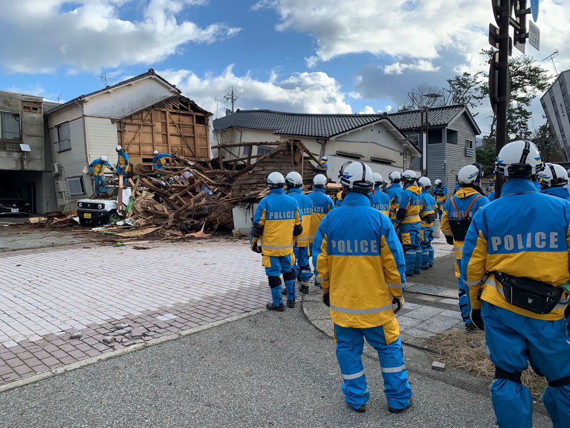 Firefighters, police, military personnel and rescue workers from across the country have been dispatched to the prefecture.