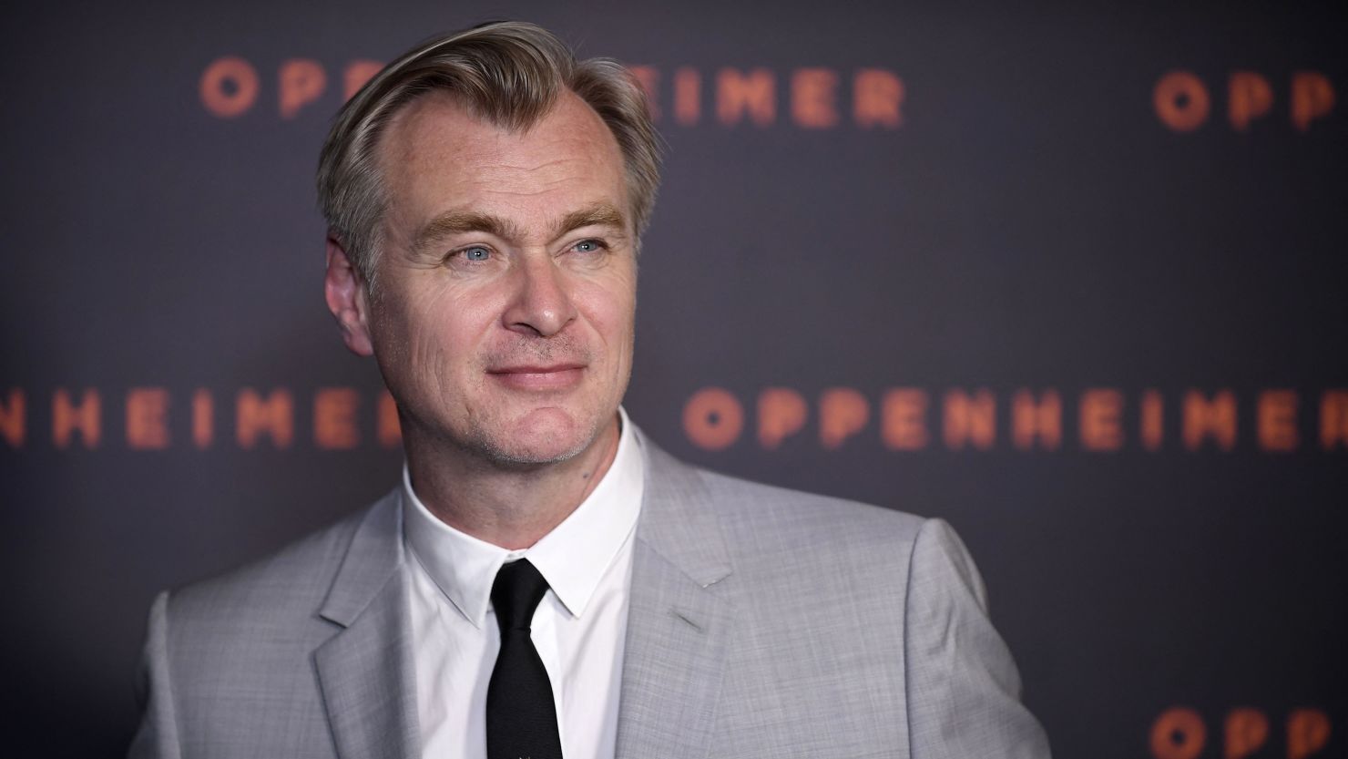 US-British film director Christopher Nolan poses upon his arrival for the "Premiere" of the movie "Oppenheimer" at the Grand Rex cinema in Paris on July 11, 2023.