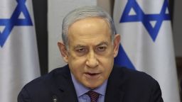 Israeli Prime Minister Benjamin Netanyahu attends the weekly cabinet meeting at the the Kirya military base in Tel Aviv, Israel Sunday, Dec. 31, 2023. (Abir Sultan/Pool Photo via AP)