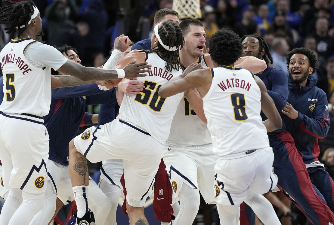 SAN FRANCISCO, CALIFORNIA - JANUARY 04: Nikola Jokic #15 of the Denver Nuggets celebrates with teammates after scoring a game winning three-point shot at the end of the fourth quarter to defeat the Golden State Warriors 130-127 at Chase Center on January 04, 2024 in San Francisco, California. NOTE TO USER: User expressly acknowledges and agrees that, by downloading and or using this photograph, User is consenting to the terms and conditions of the Getty Images License Agreement. (Photo by Thearon W. Henderson/Getty Images)