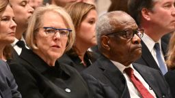 US Supreme Court justice Clarence Thomas and his wife Ginni Thomas attend a memorial service for former US Supreme Court Justice Sandra Day O'Connor at the National Cathedral in Washington, DC, on December 19, 2023. O'Connor, the first woman US Supreme Court justice, died on December 1, 2023 at 93 of complications related to advanced dementia and a respiratory illness. She served as one of the nine justices on the court until 2006 and wielded enormous influence as a crucial 