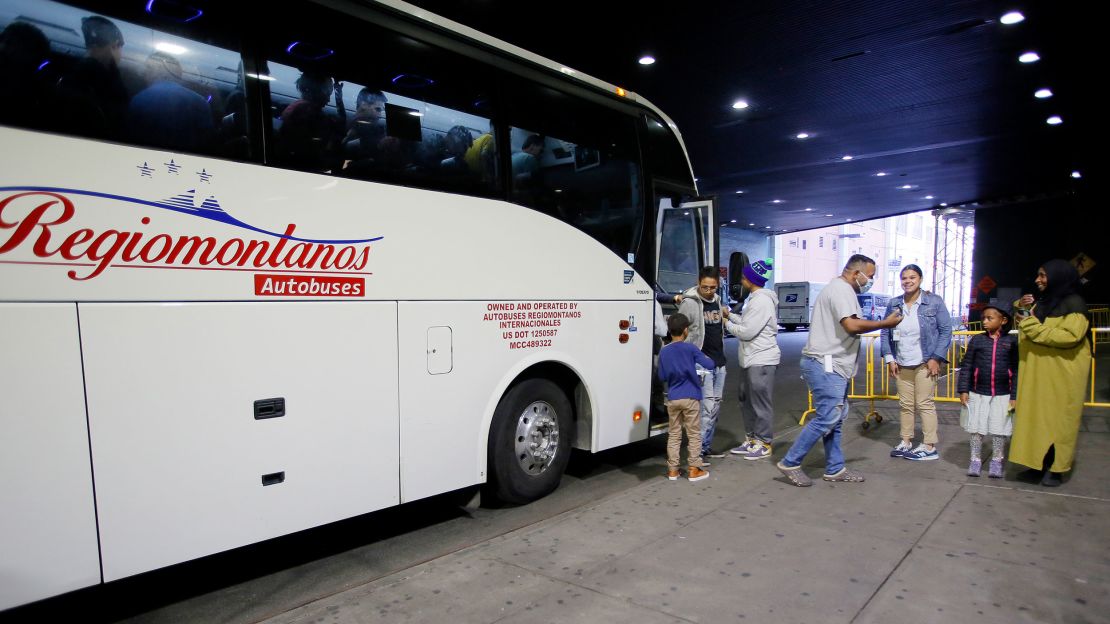 NEW YORK, NEW YORK - OCTOBER 7: Migrants arrive on a bus from Texas to the Port Authority bus station on October 7, 2022 in New York City. NYC Mayor Eric Adams declared a state of emergency in response to thousands of migrants bused to the city in recent months from the U.S. southern border. (Photo by Leonardo Munoz/VIEWpress)