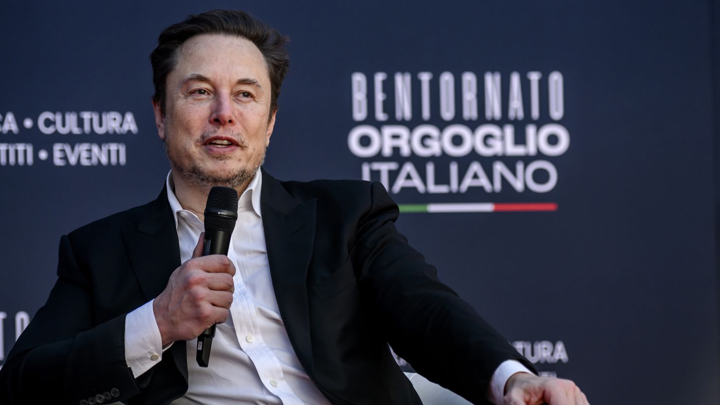 ROME, ITALY - DECEMBER 15: Elon Musk, chief executive officer of Tesla Inc and X (formerly Twitter) Ceo speaks at the Atreju political convention organized by Fratelli d'Italia (Brothers of Italy), on December 15, 2023 in Rome, Italy. Italian Prime Minister Giorgia Meloni's right-wing political party organised a four-day political festival in the Italian capital. (Photo by Antonio Masiello/Getty Images)