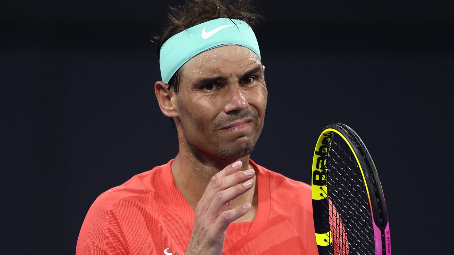 BRISBANE, AUSTRALIA - JANUARY 05: Rafael Nadal of Spain looks on in his match against Jordan Thompson of Australia  during day six of the  2024 Brisbane International at Queensland Tennis Centre on January 05, 2024 in Brisbane, Australia. (Photo by Chris Hyde/Getty Images)