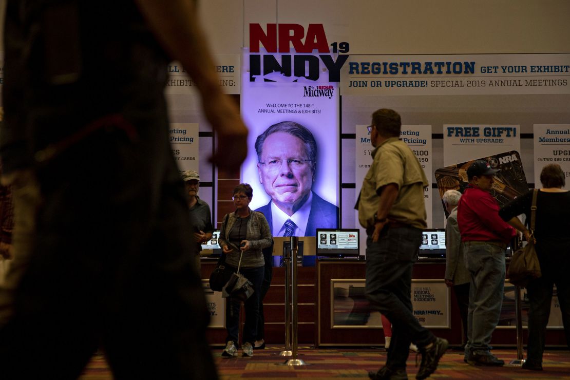 An image of Wayne LaPierre, chief executive officer of the National Rifle Association (NRA), hangs above a registration desk ahead of the NRA annual meeting at the Indiana Convention Center in Indianapolis, Indiana U.S., on Thursday, April 25, 2019. President Donald Trump will speak at the NRA Institute for Legislative Action (NRA-ILA) Leadership Forum on Friday. Photographer: Daniel Acker/Bloomberg via Getty Images