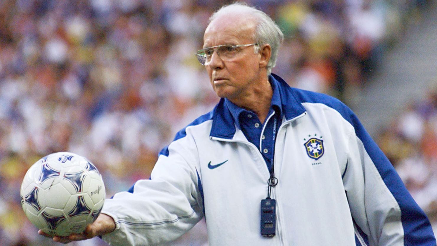 SAINT-DENIS, :  Brazilian coach Mario Zagallo holds the ball 12 July during the 1998 World Cup final between Brazil and France at the Stade de France in Saint-Denis. Host France beat defending champion Brazil 3-0 and won the 1998 FIFA trophy.
