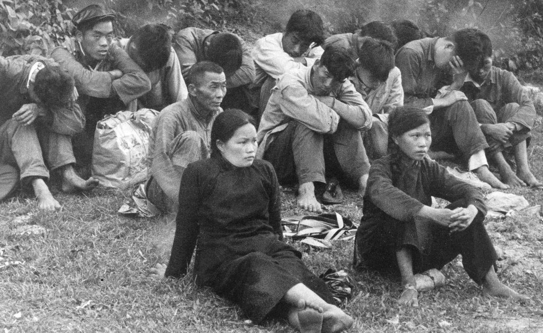 People escaping famine in mainland China were detained by Hong Kong police and British troops after crossing the border into the city in May 1962